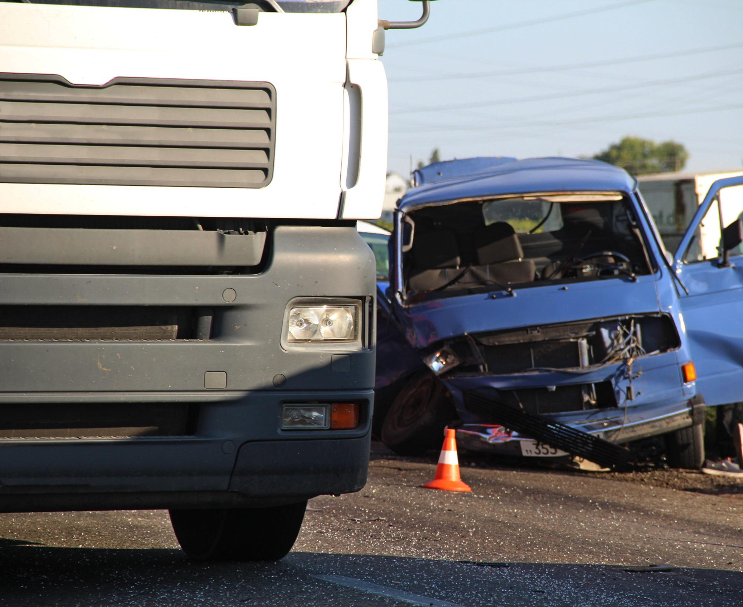 Damaged vehicle after a blind spot truck accident, illustrating the dangers of limited visibility and the need for legal guidance.