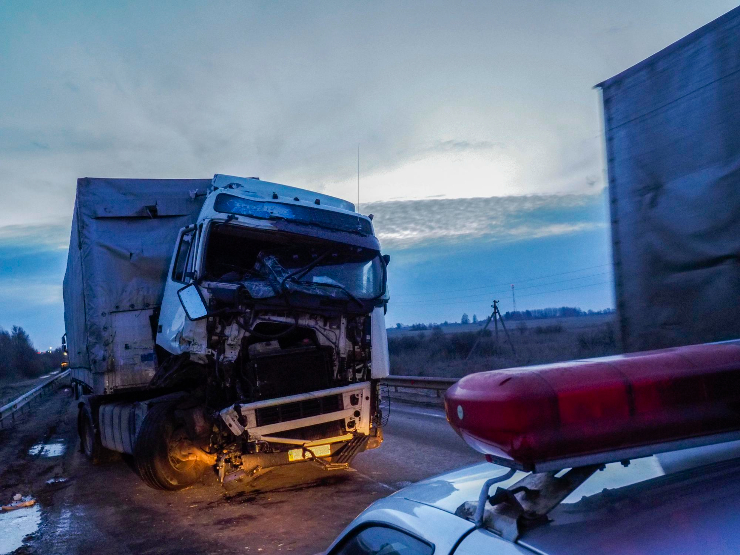 Scene of a serious truck accident on Interstate 74, highlighting the dangers of highway collisions and the need for legal assistance.